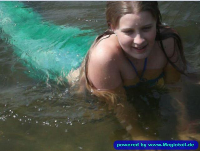 Me with my tail.:me in the water-~Amber