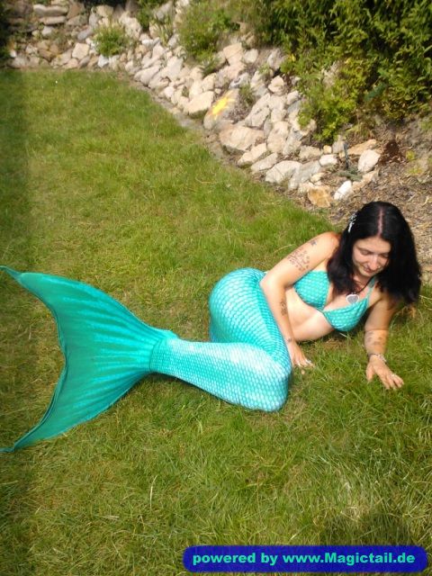 Eileen the mermaid:Wearing my tail for the first time-Eileen S.